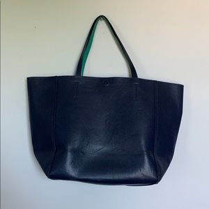 Reversible faux leather tote